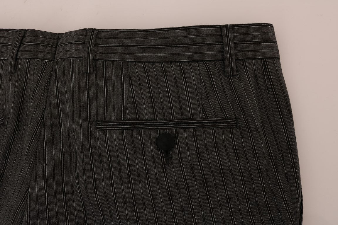 Pantalon formel en laine grise à rayures de Dolce & Gabbana, style élégant et sophistiqué pour occasions formelles.