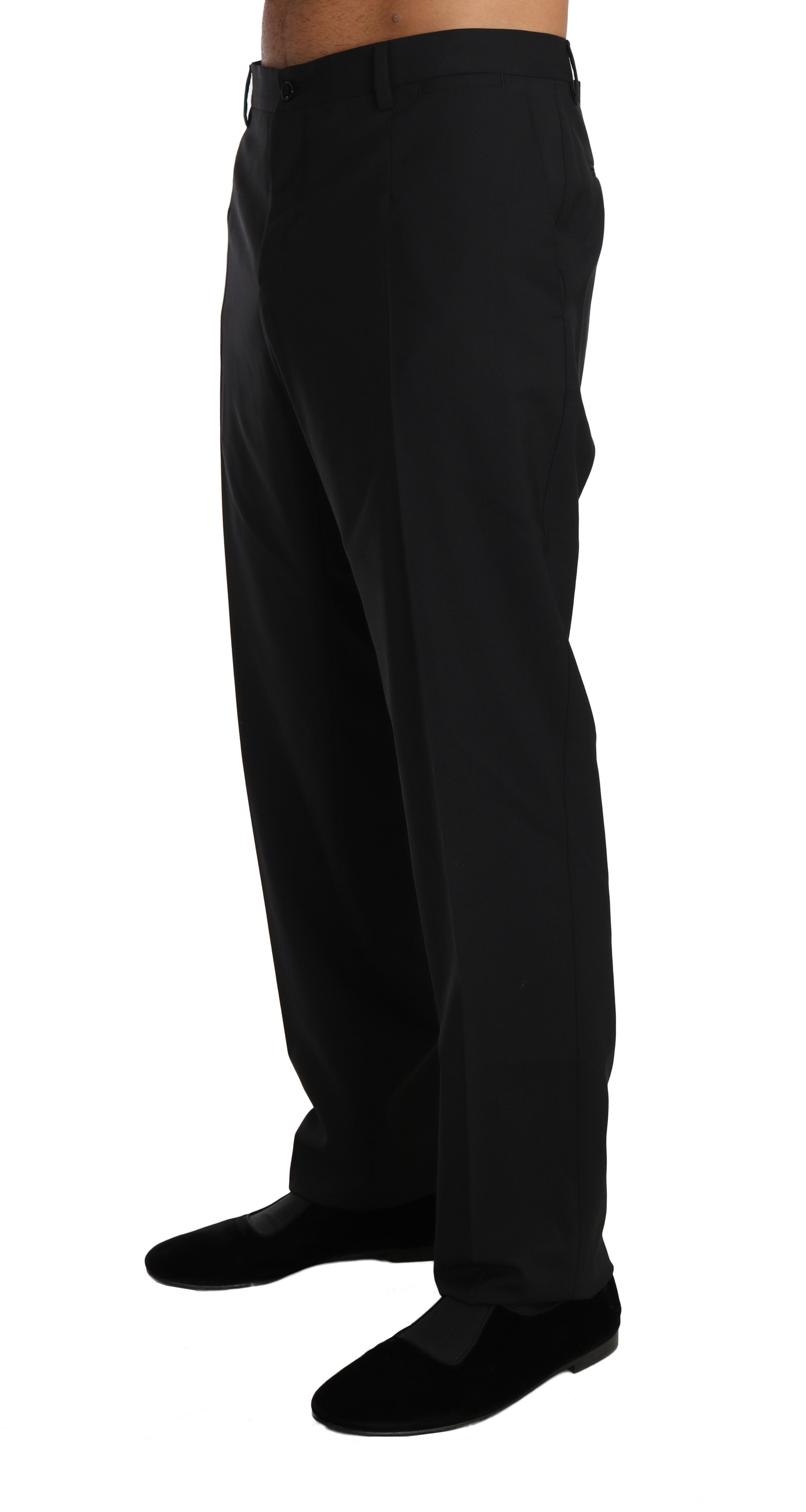 Pantalons formels en laine stretch noire de Dolce & Gabbana, coupe élégante et tissu de haute qualité pour homme.