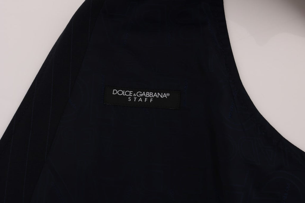 Gilet en laine extensible bleu Dolce & Gabbana STAFF, coupe ajustée et détails élégants, porté en veste décontractée homme.