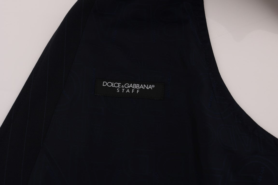 Gilet en laine extensible bleu Dolce & Gabbana STAFF, coupe ajustée et détails élégants, porté en veste décontractée homme.