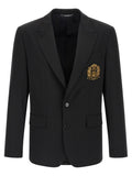 Veste blazer en laine vierge noire Dolce & Gabbana, coupe classique, détails élégants, portée élégante et sophistiquée.