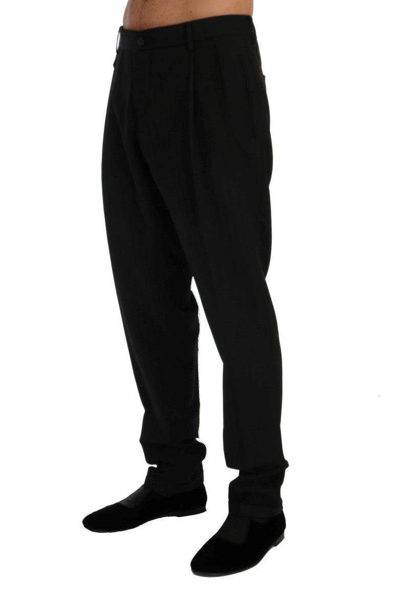 Pantalon en laine noire à rayures, stretch, de la marque Dolce & Gabbana, présenté sur un mannequin.