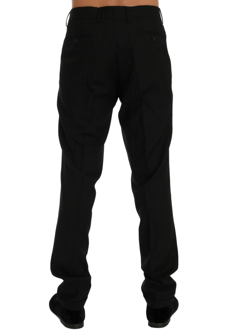 Pantalon en laine stretch noir à rayures de Dolce & Gabbana, coupe élégante et design sophistiqué.