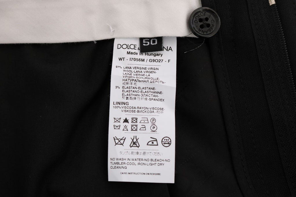 Pantalons Dolce & Gabbana en laine noire à rayures, coupe stretch, élégants et sophistiqués, visibles en détail.