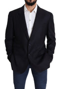 Blazer noir en laine Dolce & Gabbana à un seul bouton, style Napoli, porté sur un mannequin avec boutons et poche poitrine visible.
