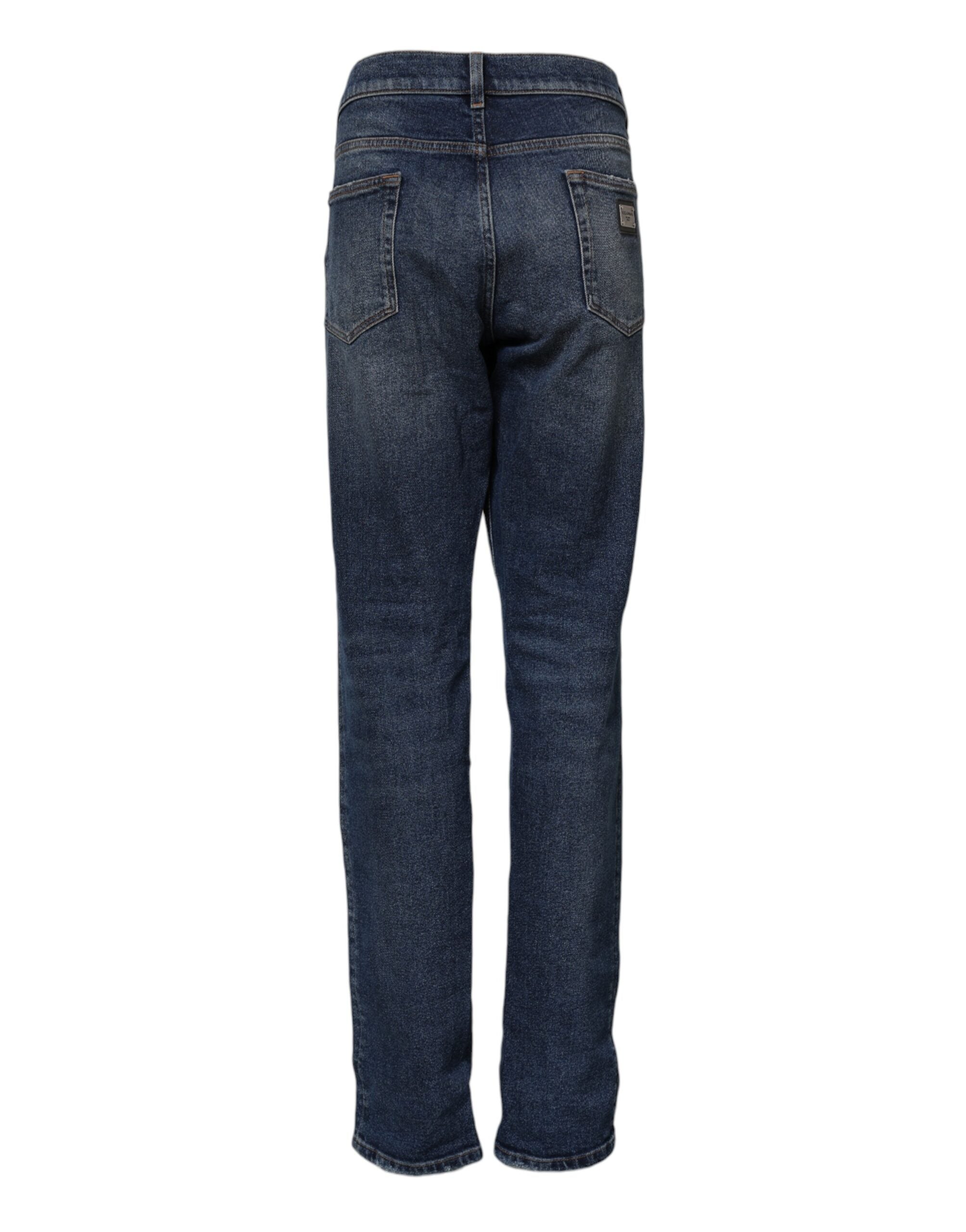 Jeans en denim bleu Dolce & Gabbana, taille moyenne, coupe droite, en coton, visible sur l'image.