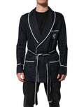 Veste blazer Dolce & Gabbana bleu marine avec broderie DG, élégante robe ou blazer en tissu sophistiqué.