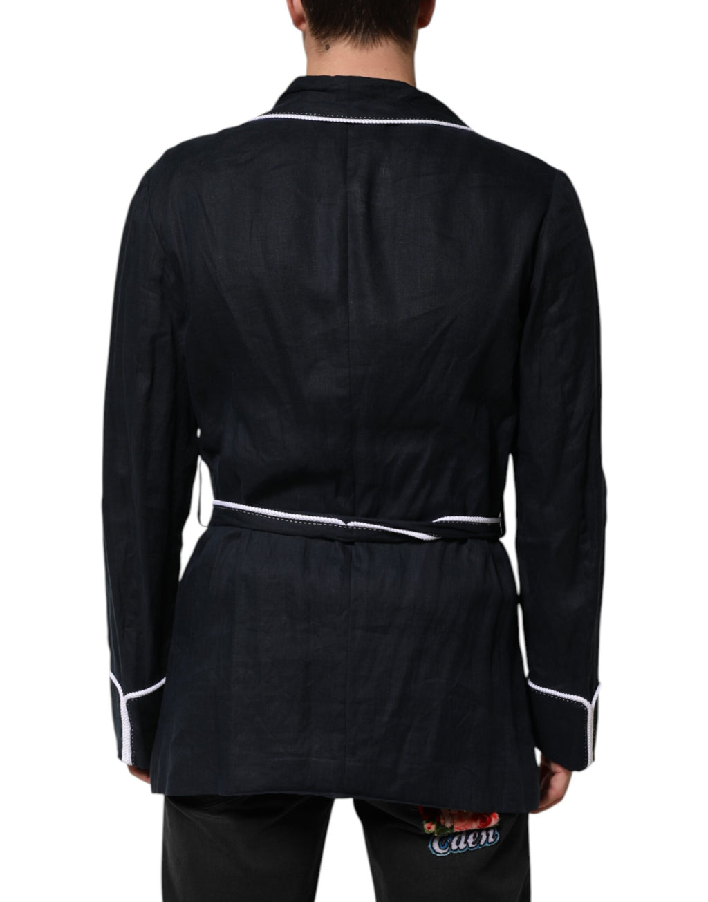 Veste blazer Dolce & Gabbana en bleu foncé avec broderies DG, élégante et sophistiquée, portée en robe ou veste.
