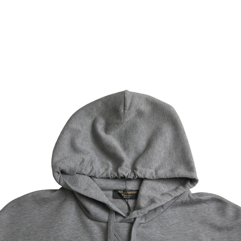 Sweat à capuche en coton gris Dolce & Gabbana avec logo, style décontracté et confortable, visible sur cette image.