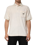 Polo dolce & gabbana ivoire en coton terry avec poche logo et texture subtile manches courtes