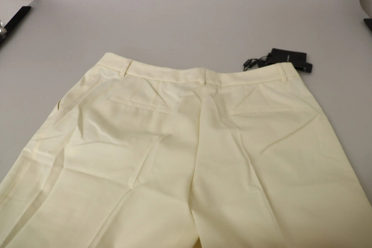 Pantalon court ivoire à taille haute dolce & gabbana en tissu crème avec pli discret à la taille et design structuré