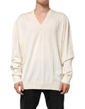 Pull col v en laine vierge ivoire pour homme dolce & gabbana à manches longues et poignets côtelés ample