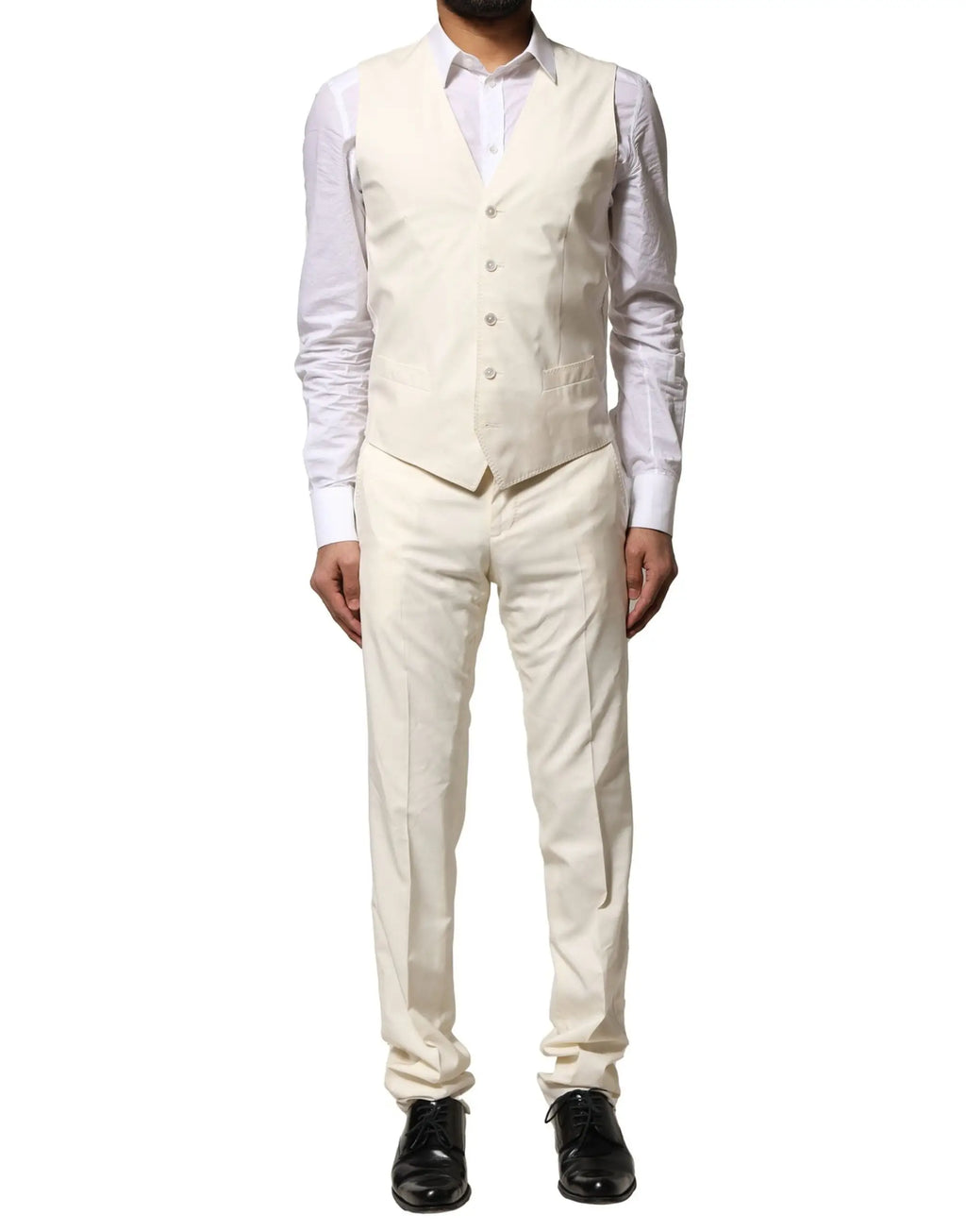 Gilet crème tailleur dolce & gabbana en laine ivoire avec fermeture à boutons et poche à rabat porté sur chemise blanche