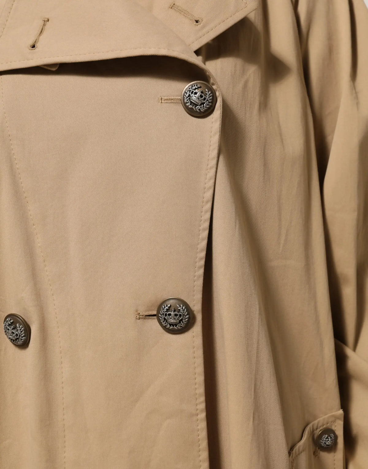 Veste trench beige dolce & gabbana en gabardine avec boutons argentés à embleme circulaire double boutonnage