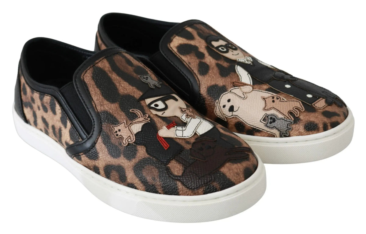 Dolce & gabbana leather leopard slip-on sneakers with cartoon dog and cat print in black beige and brown tones with white soles