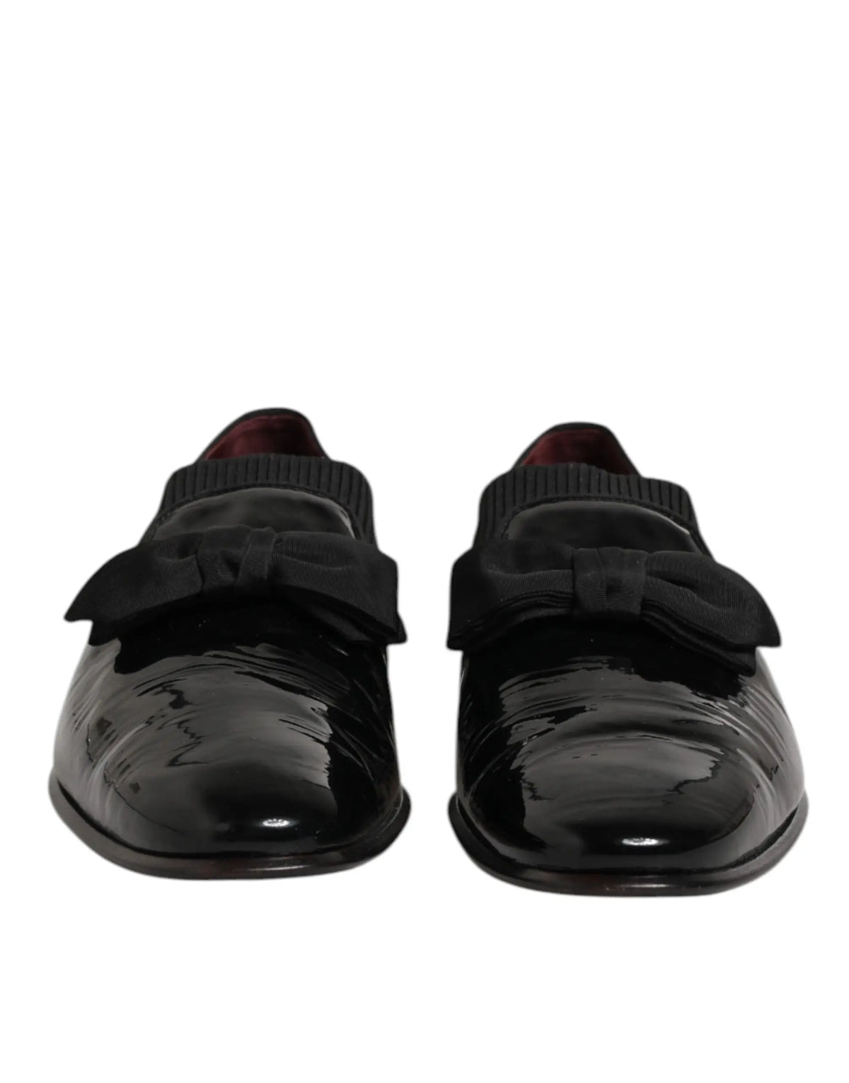 Dolce & gabbana leather loafers for men in black patent leather with knitted collar and prominent bow on the front