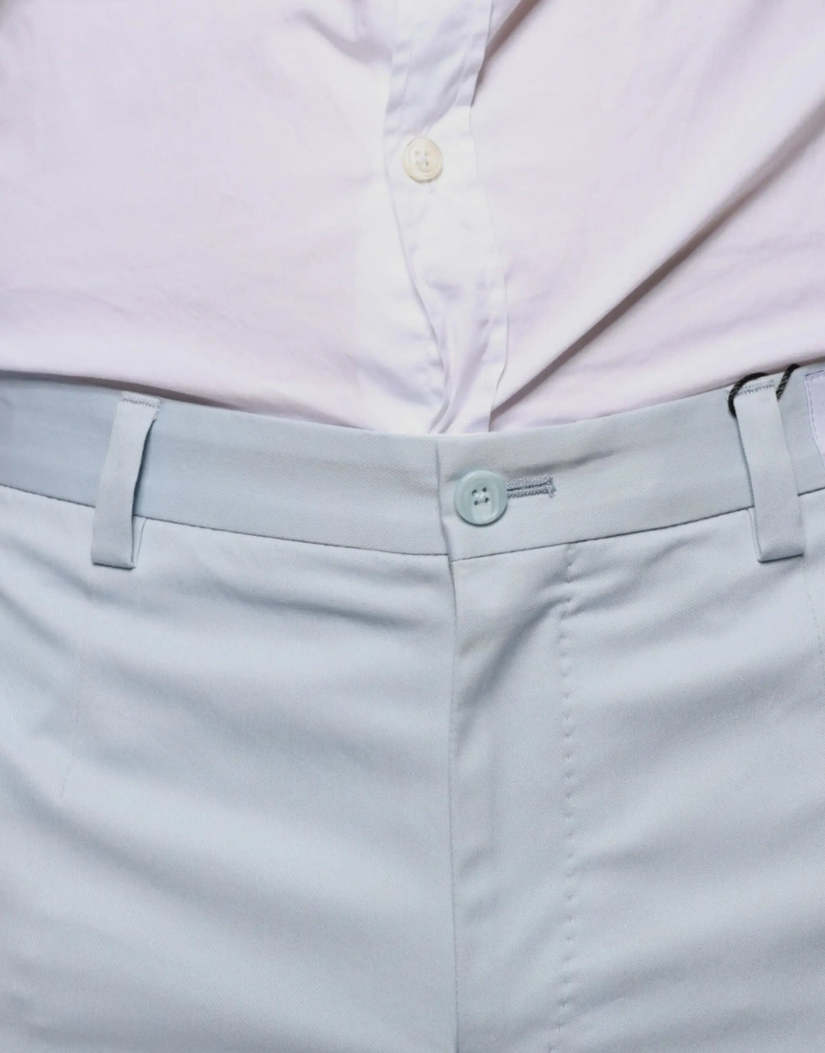 Pantalon habillé dolce & gabbana bleu clair en coton avec taille boutonnée et passants pour ceinture