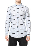 Chemise formelle dolce & gabbana en coton bleu clair à manches longues avec motif répétitif de moustaches noires