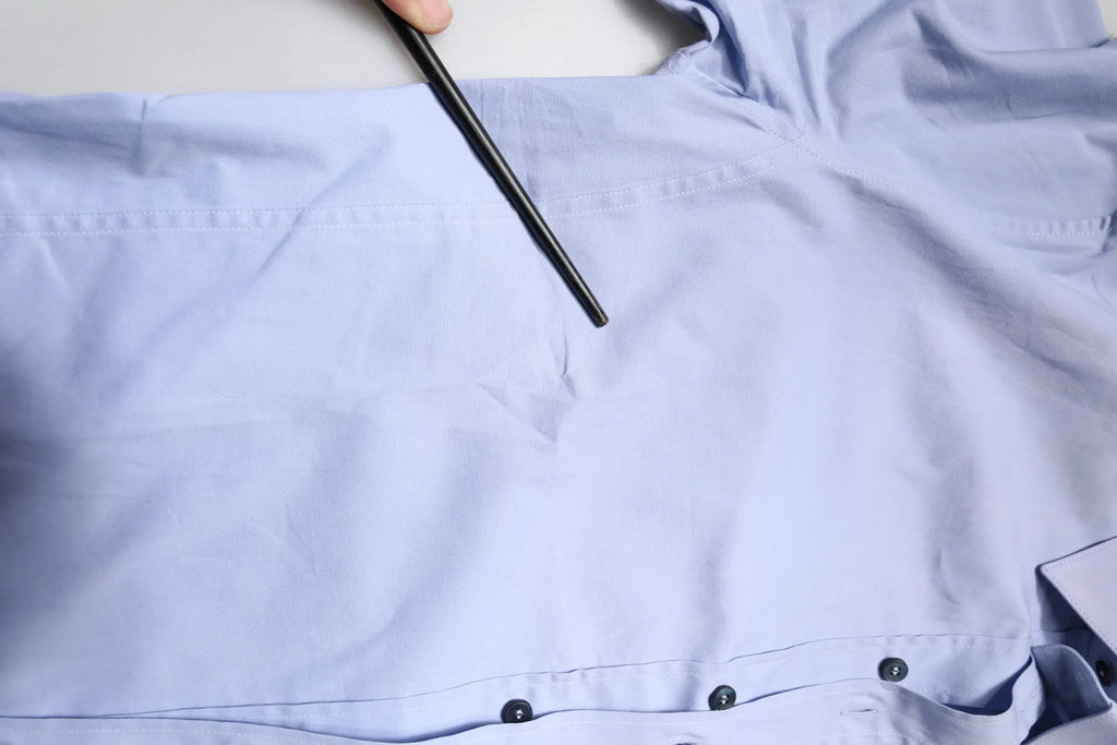 Chemise habillée dolce & gabbana sicilia en coton bleu clair avec boutons noirs et texture subtile