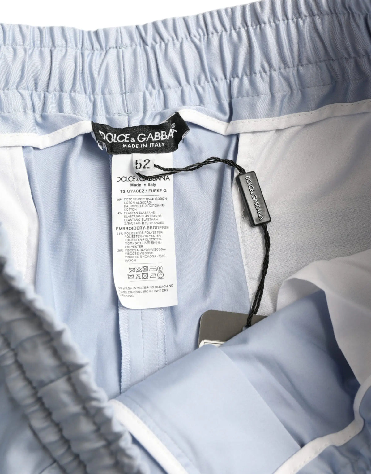 Dolce & gabbana short bleu clair en coton et polyester avec taille élastique blanche et étiquette de marque