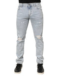 Dolce & gabbana jean slim fit bleu clair en denim délavé avec genoux déchirés et détails usés