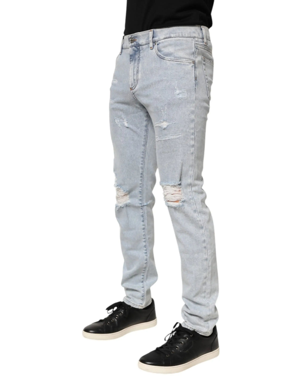 Jean slim fit bleu clair en denim délavé avec genoux déchirés et usés dolce gabbana