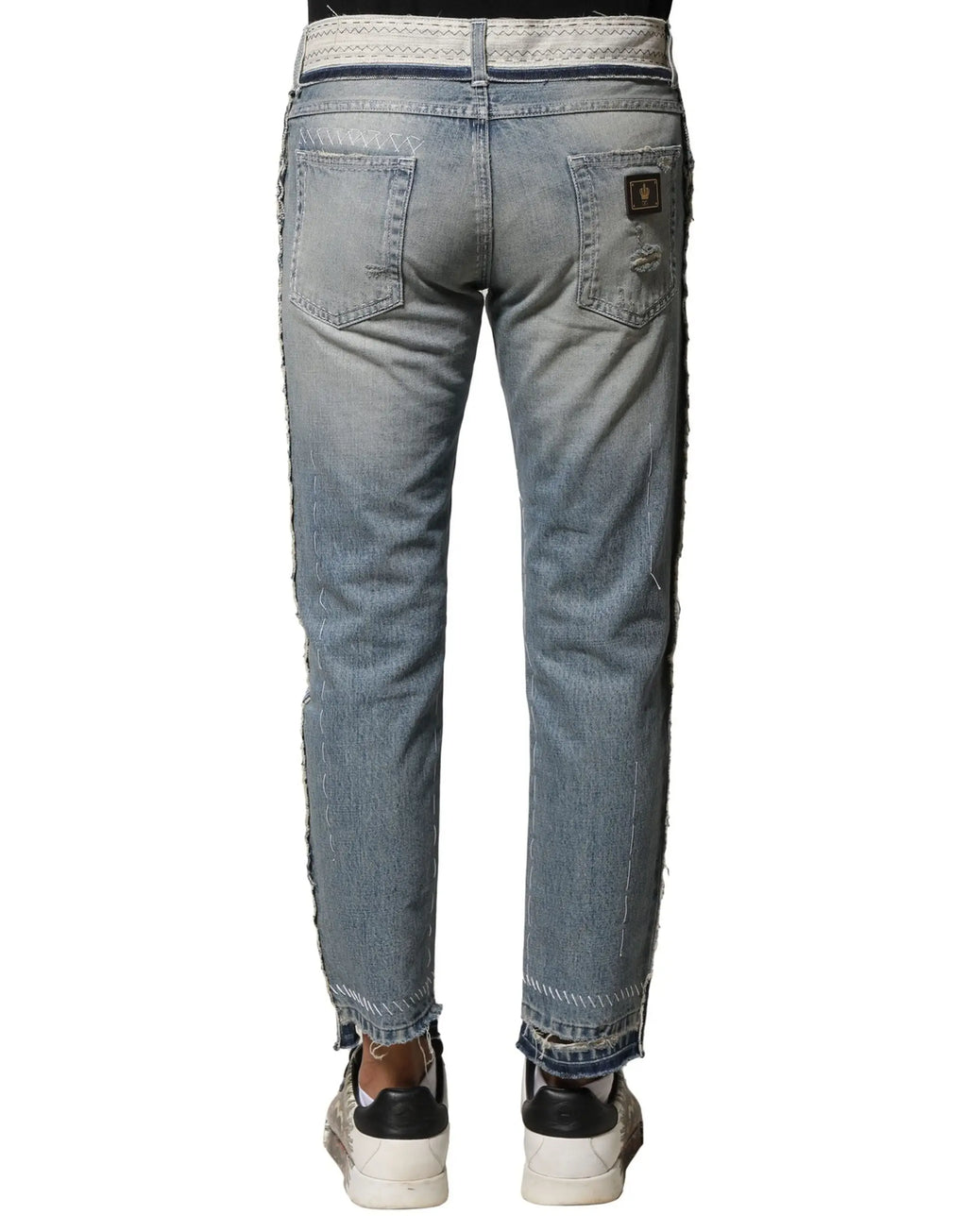 Jean droit délavé clair distressed dolce et gabbana avec bords effilochés et ceinture tressée décorative homme