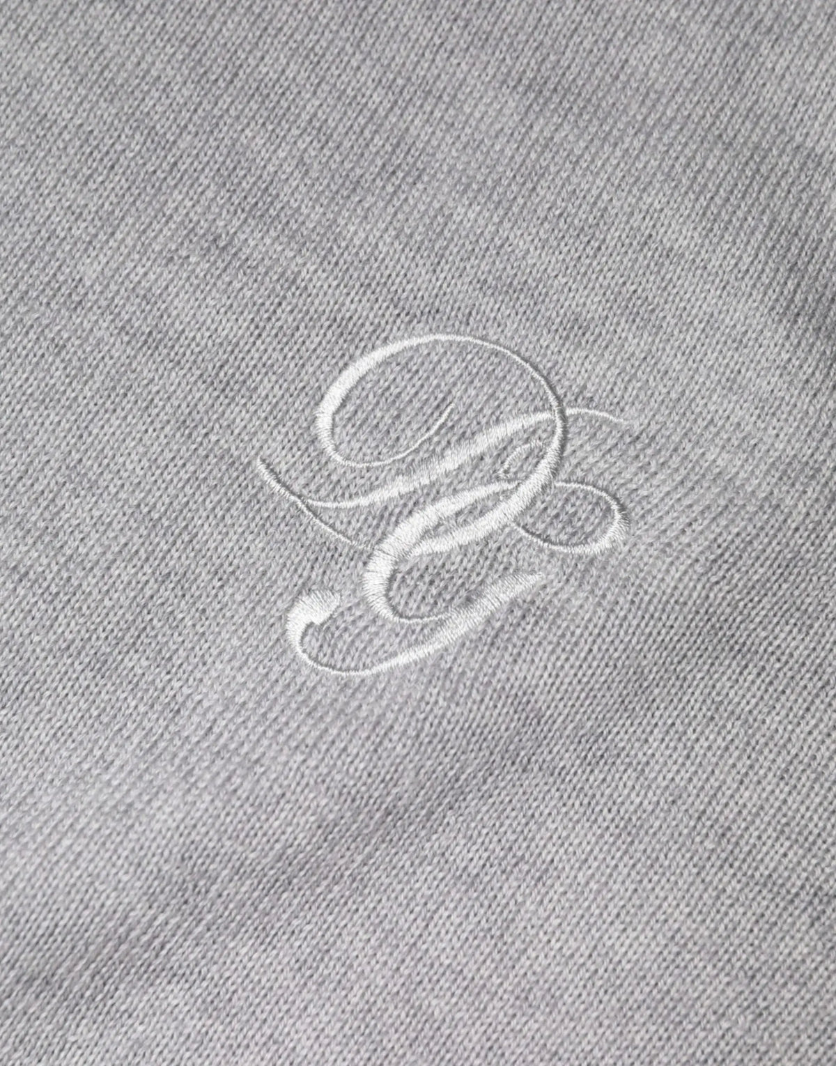Polo en coton gris chiné avec logo blanc brodé poitrine pour doucé et gabbana pull en laine col rond gris clair