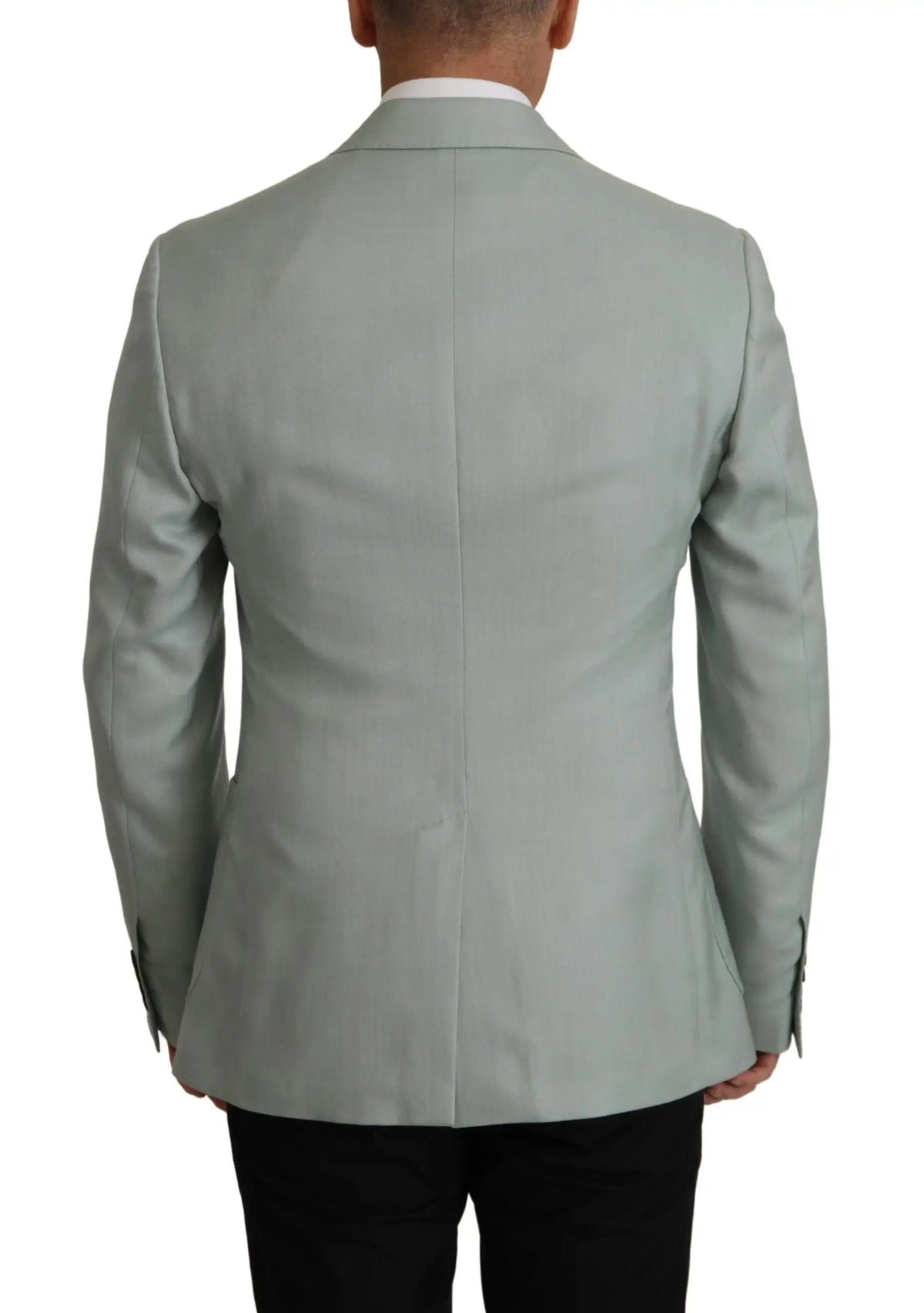 Dos d’un blazer dolce & gabbana vert clair en cachemire et soie avec un design croisé classique et texture subtile