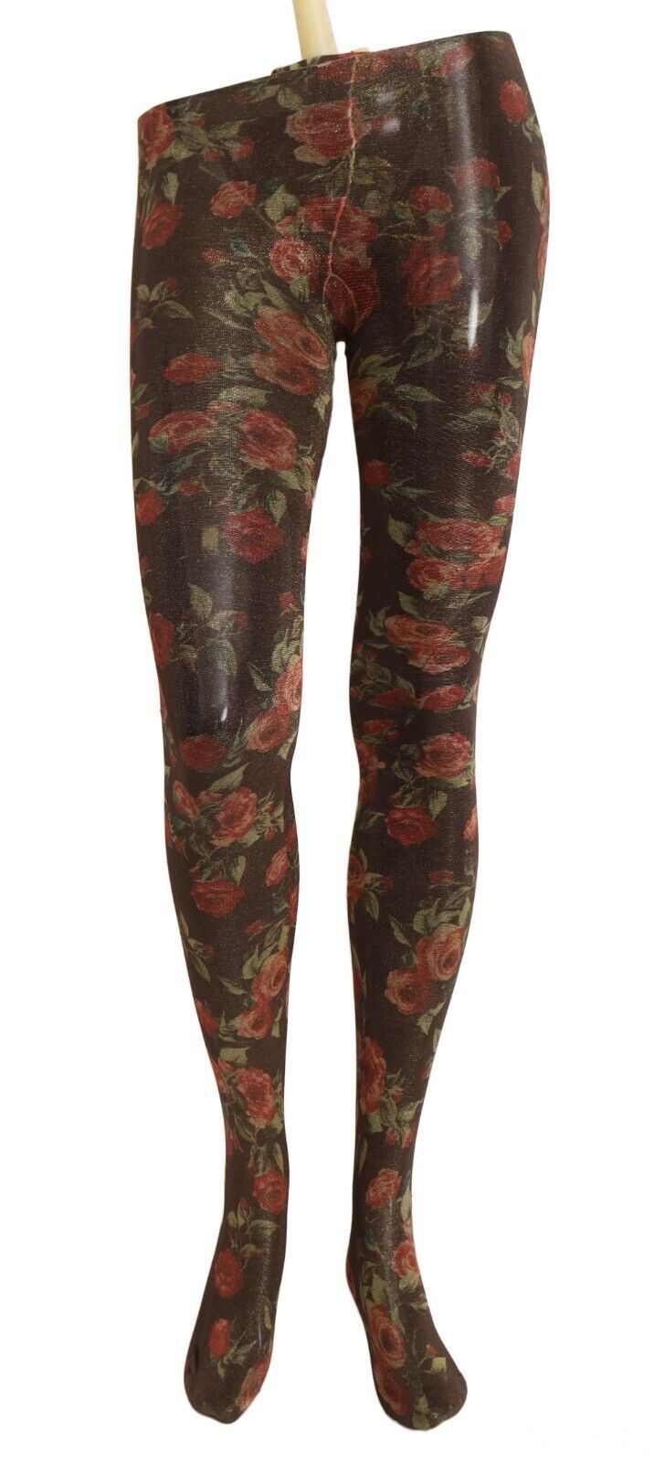 Jambes avec collants en nylon noirs à motif floral Dolce & Gabbana, style élégant et sophistiqué