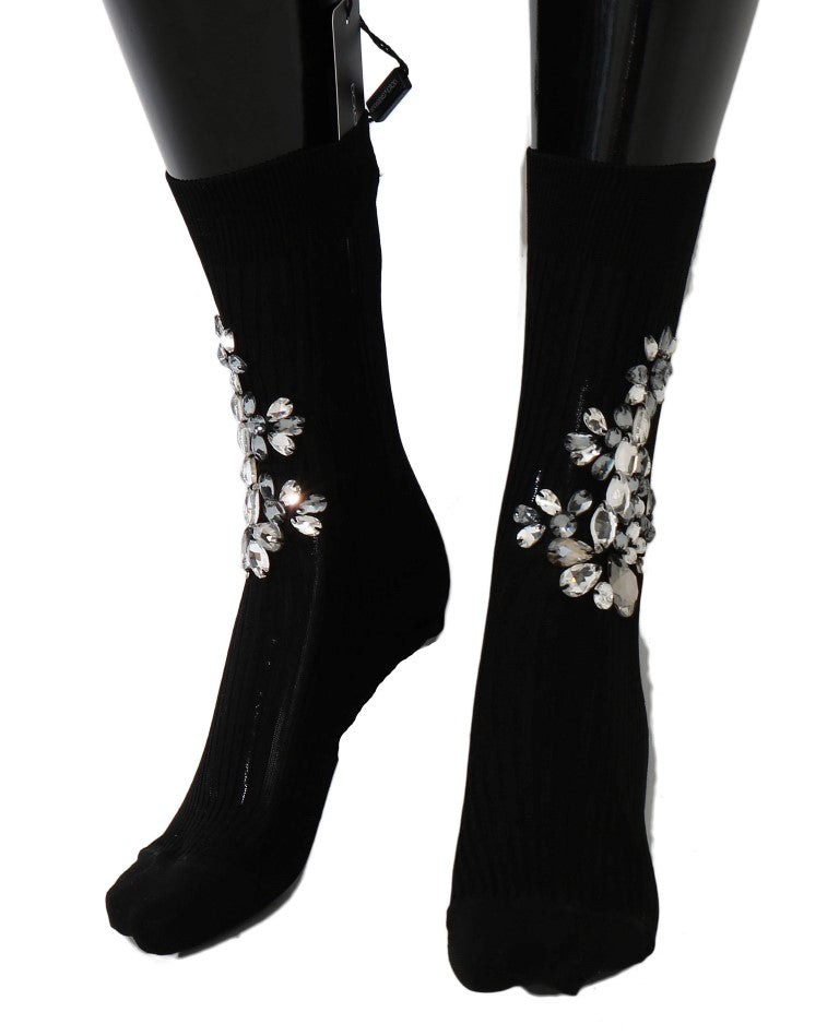 Chaussettes en maille noire Dolce & Gabbana avec motifs floraux en cristal clair, élégantes et sophistiquées.