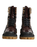Bottes moto mi-mollet dolce & gabbana en cuir marron foncé avec lacets noirs et garnitures dorées en métal