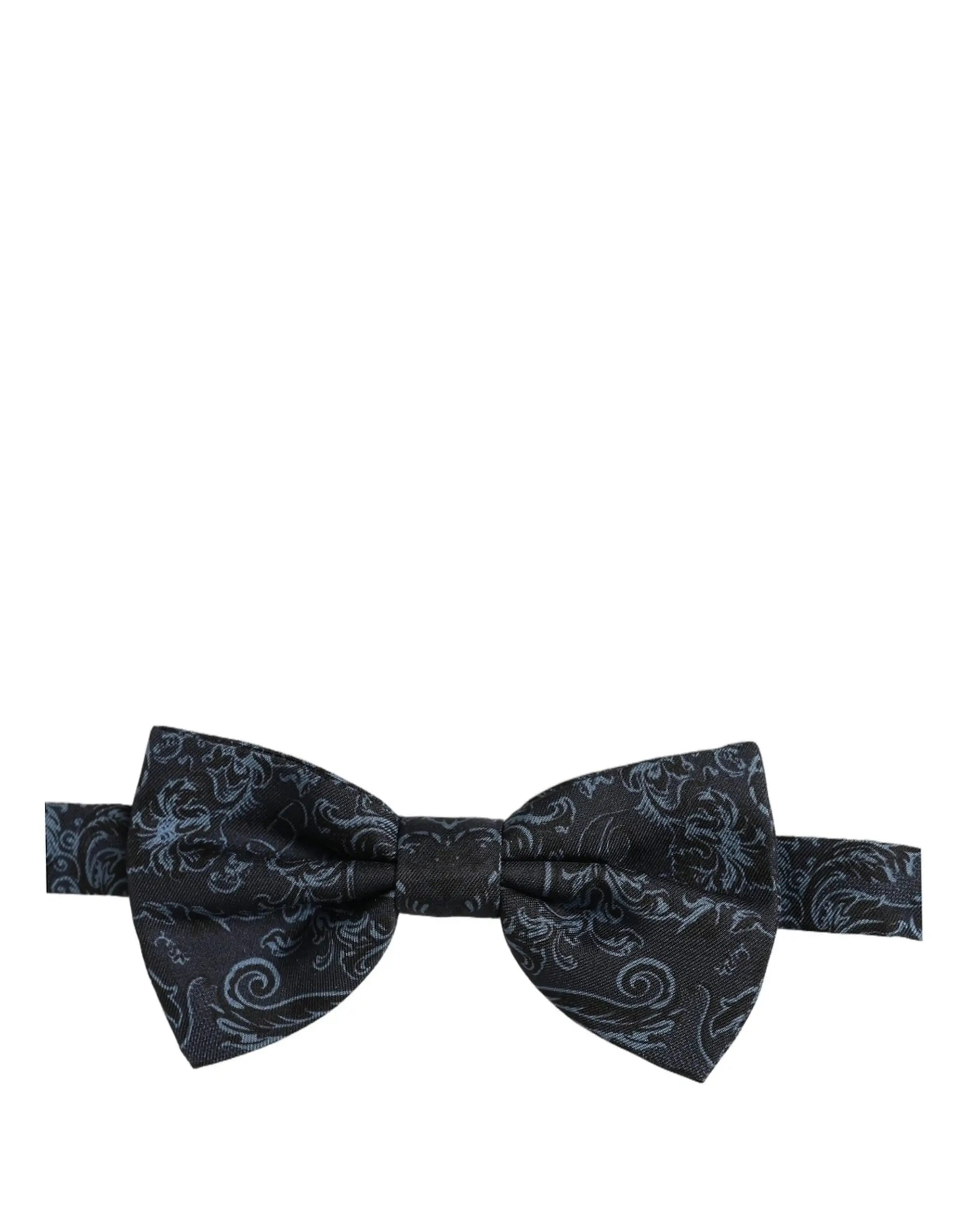 Dark navy bow tie with intricate silver paisley pattern made from smooth woven fabric by dolce & gabbana