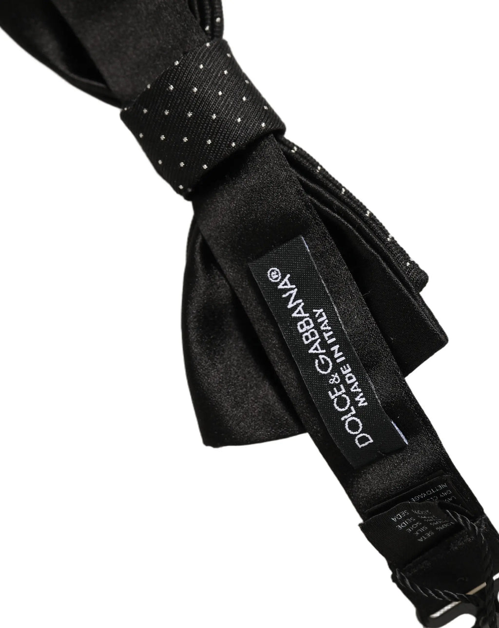 Dolce & Gabbana nœud papillon homme en soie noire à pois blancs subtils avec étiquette de marque visible