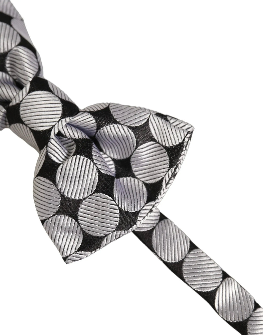 Un nœud papillon dolce & gabbana noir et argent ajustable avec motif de cercles texturés métallisés