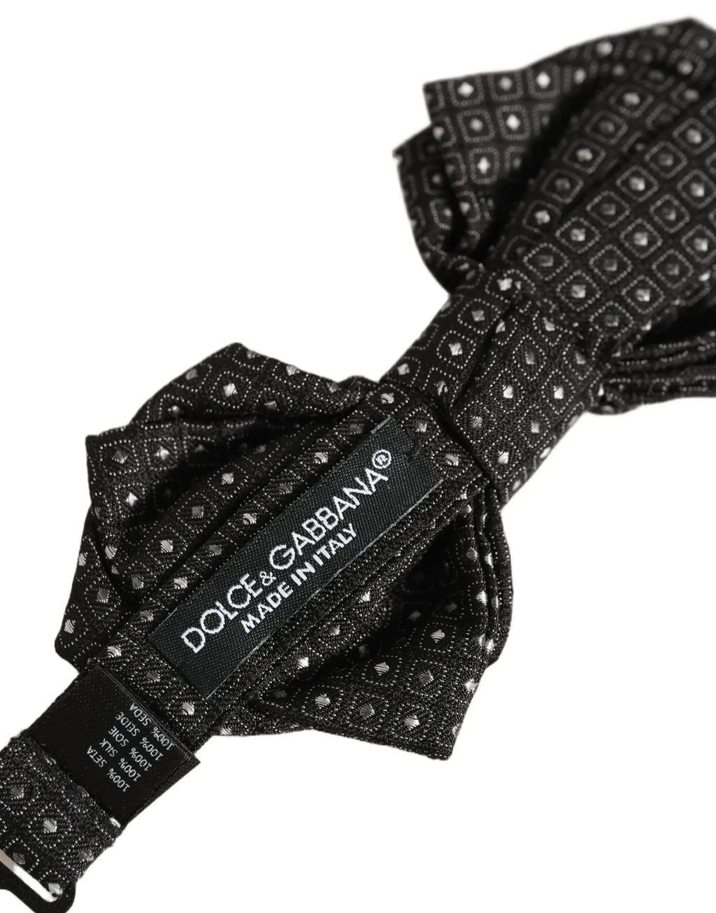 Dolce & gabbana homme nœud papillon en soie gris foncé à pois avec motif géométrique argenté subtil
