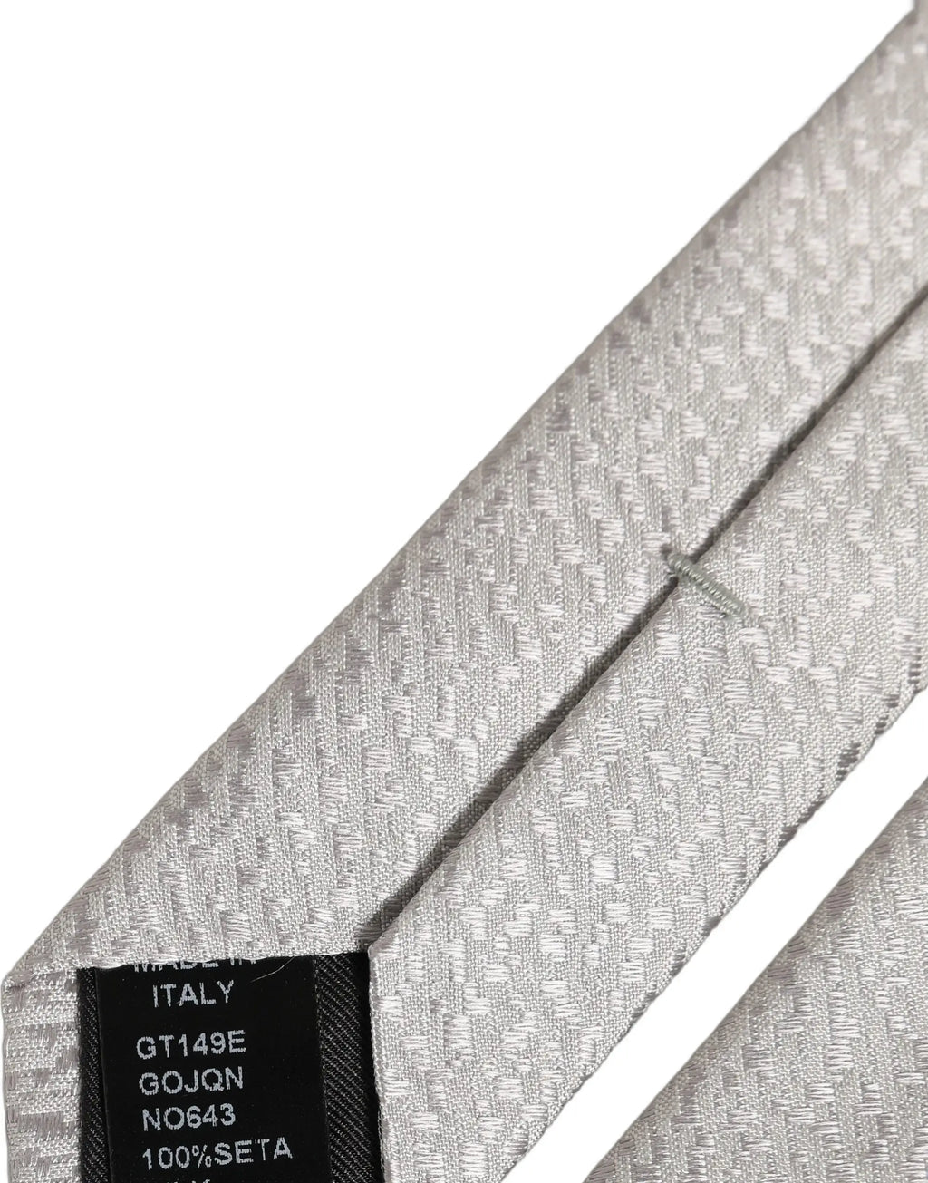 Cravate en soie grise texturée avec motif chevrons subtile dolce & gabbana pour homme fabriquée en italie