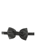 Dolce & gabbana homme nœud papillon en soie gris foncé métallique avec tissu texturé et réglable au cou