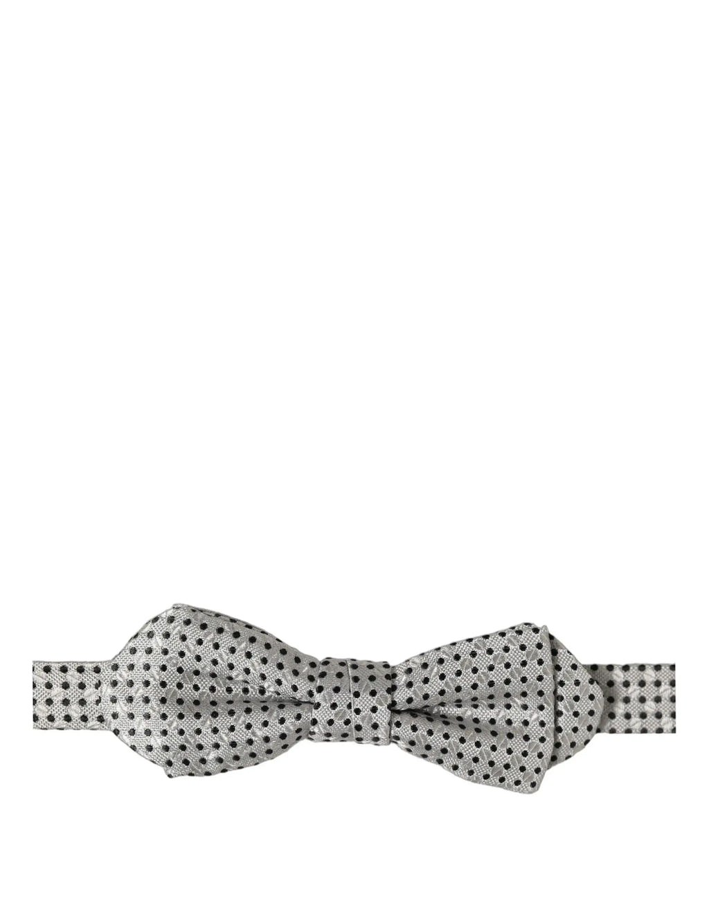 Un noeud papillon ajustable dolce & gabbana en soie argentée avec un motif discret de pois noirs