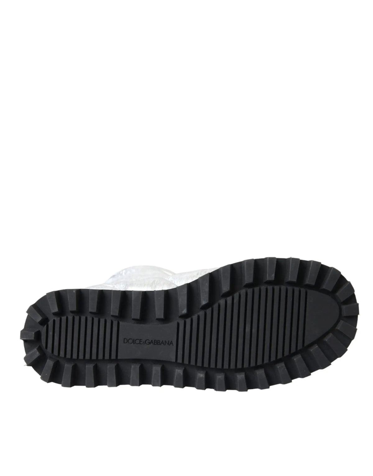 Semelle extérieure noire en caoutchouc à semelles profondes avec logo dolce et gabbana embossé au centre des bottes argentées métalliques matelassées dolce et gabbana