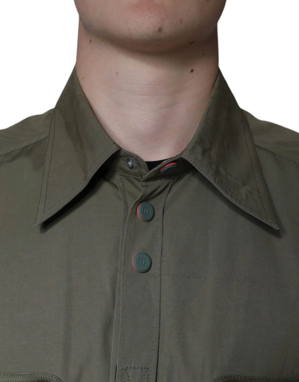 Olive green cotton bend collared coat jacket by dolce & gabbana with dark teal buttons and subtle red white logo