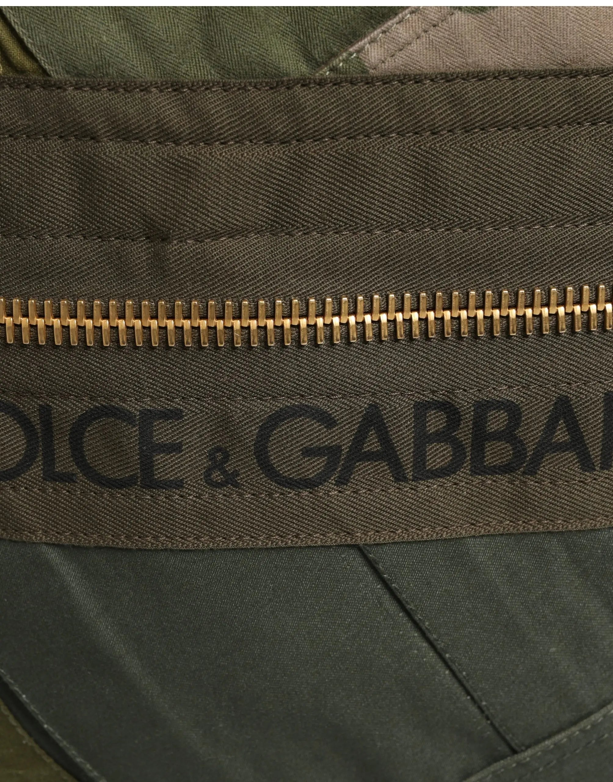Olive green canvas belt with gold-tone zipper and black dolce & gabbana branding for military green patchwork backpack