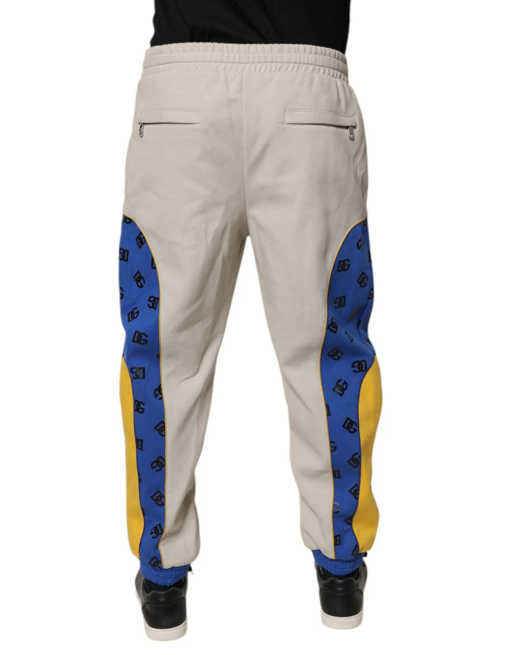 Beige coton dolce & gabbana jogger avec panneaux latéraux bleus et jaunes à motif logo dc répétitif