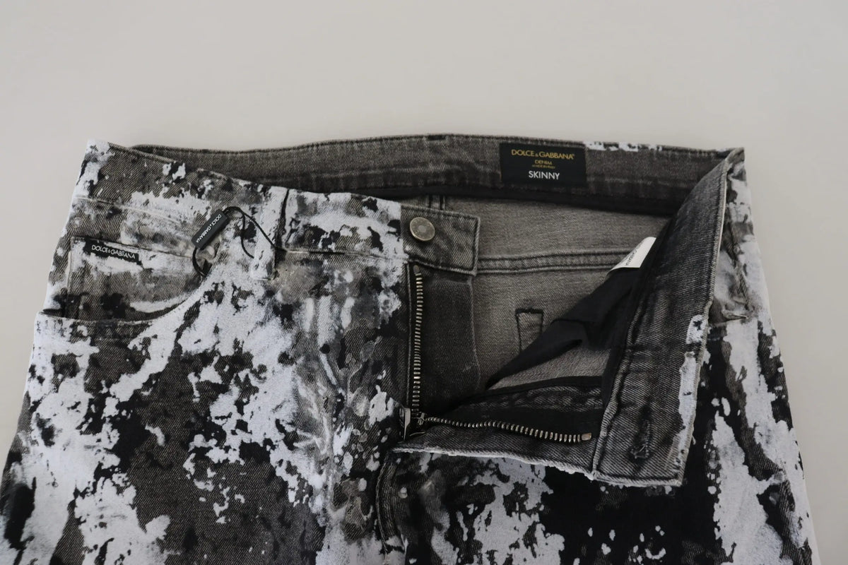 Jeans slim en denim tie dye multicolore noir et blanc en coton avec étiquette dolce & gabbana visible