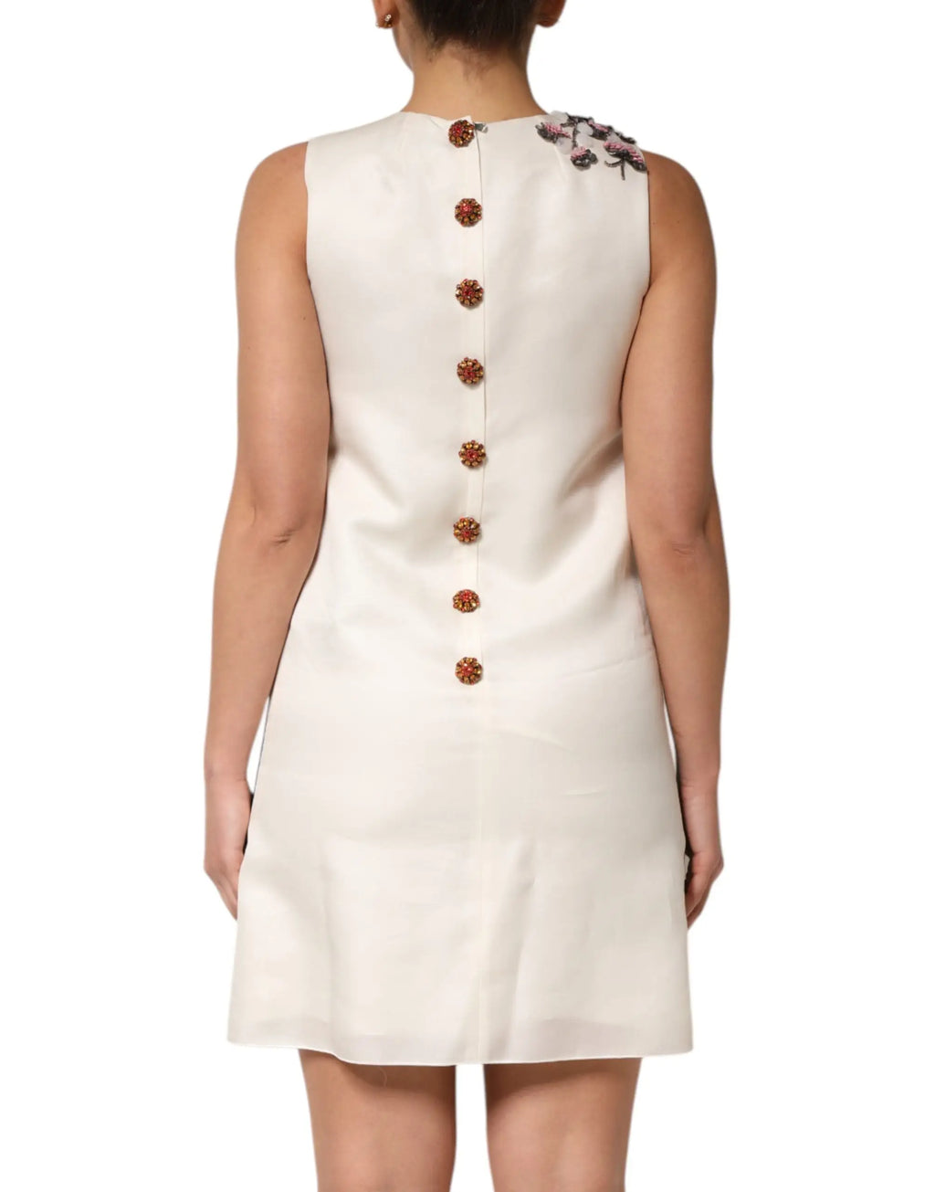 Robe blanche sans manches dolce & gabbana avec fermeture boutonnée au dos et broderie florale à lépaule