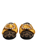 Mules en satin noir dolce & gabbana avec nœuds plissés dorés et boucles incrustées de cristaux