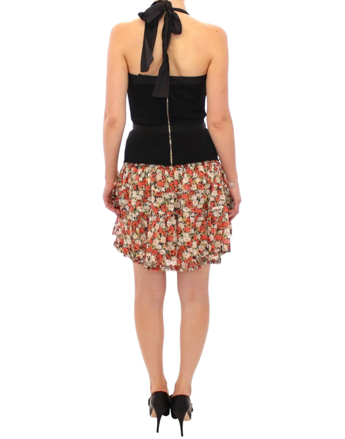 Vue de dos robe dolce & gabbana multicolore avec haut dos nu noir à fermeture éclair dorée et jupe à volants florale orange et crème