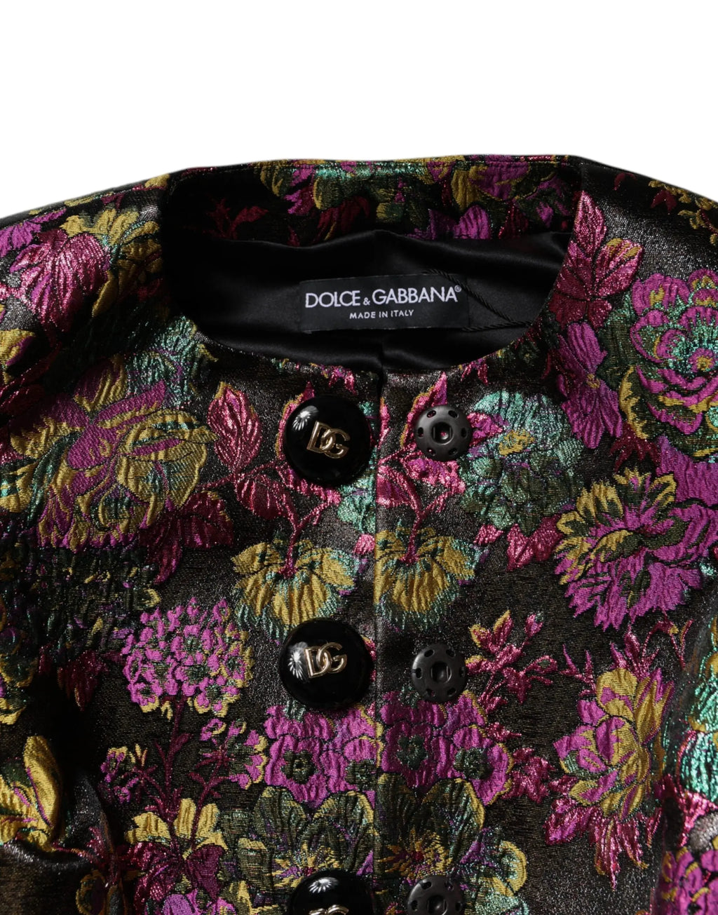 Veste courte dolce & gabbana en jacquard floral multicolore avec motif vibrant violet rose et or sur fond sombre