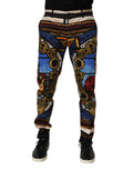 Joggers à motif inspiré du vitrail en bleus vifs or et rouges avec motifs de couronne dolce & gabbana