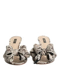 Dolce gabbana keira mules en cuir multicolores à imprimé serpent avec grand nœud texturé avant et bout ouvert